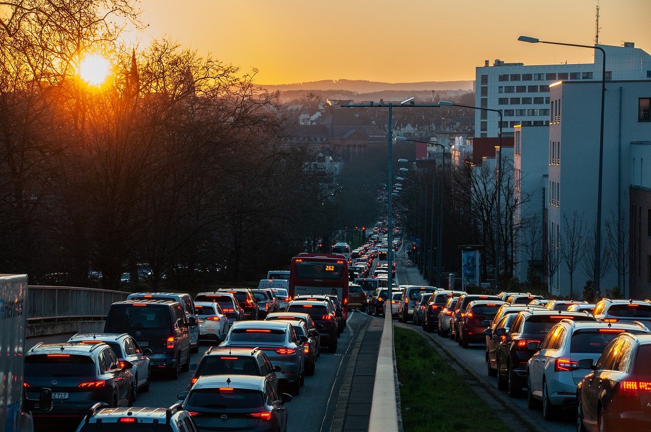 An image of a traffic jam while the sun it setting