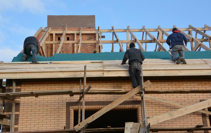 contractors working on roof