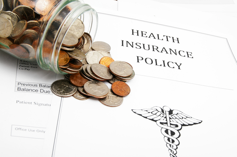 change spilling out over health insurance policy papers