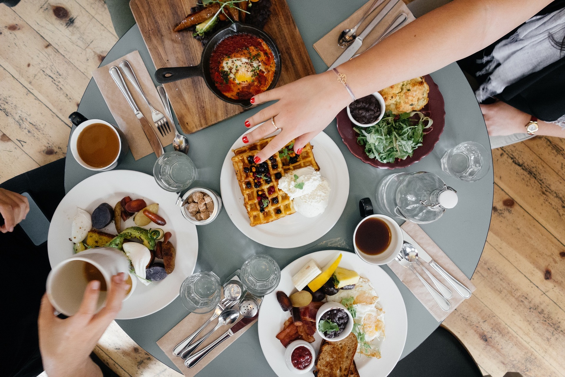 breakfast food laid out on restaurant table