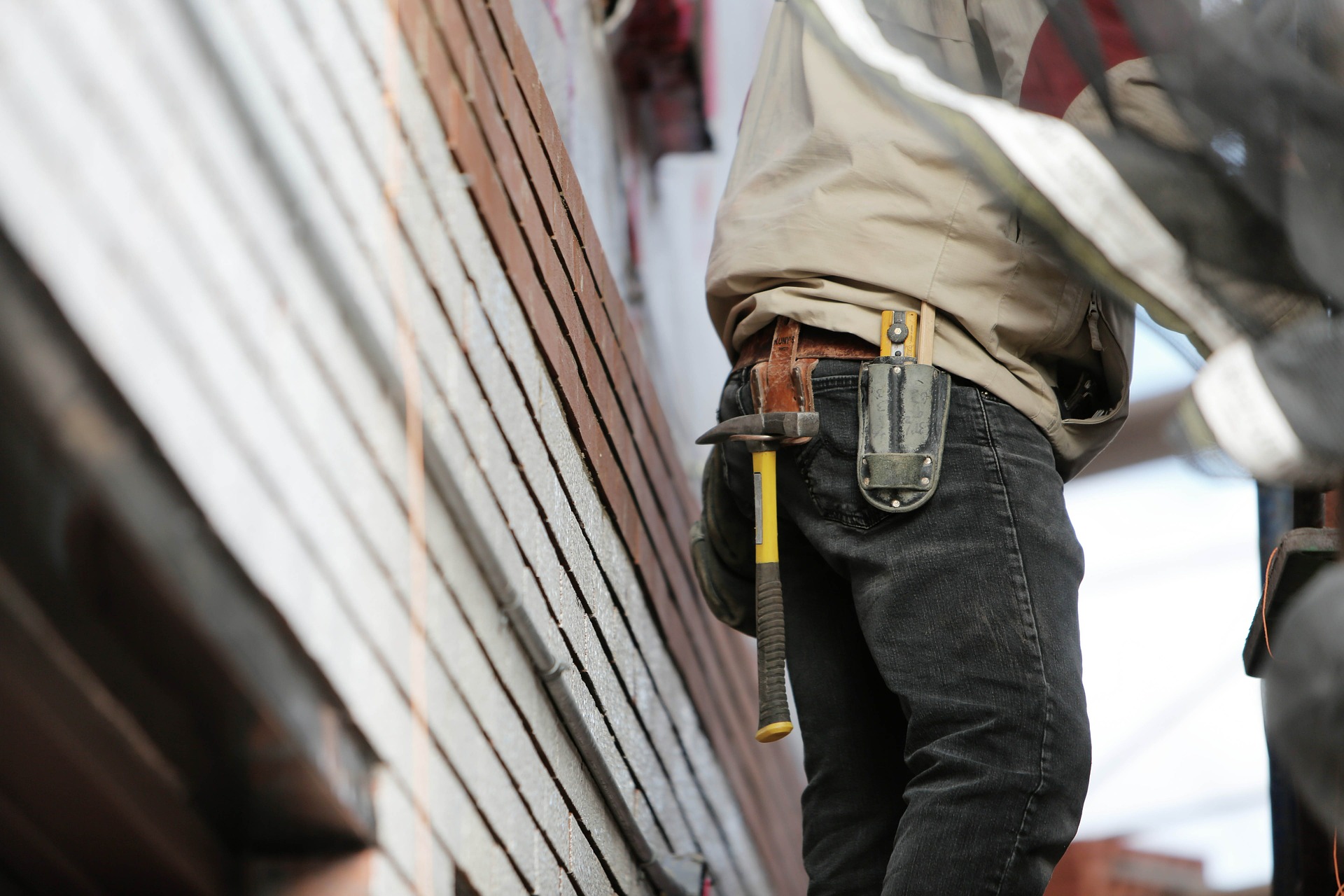 construction worker with toolbelt