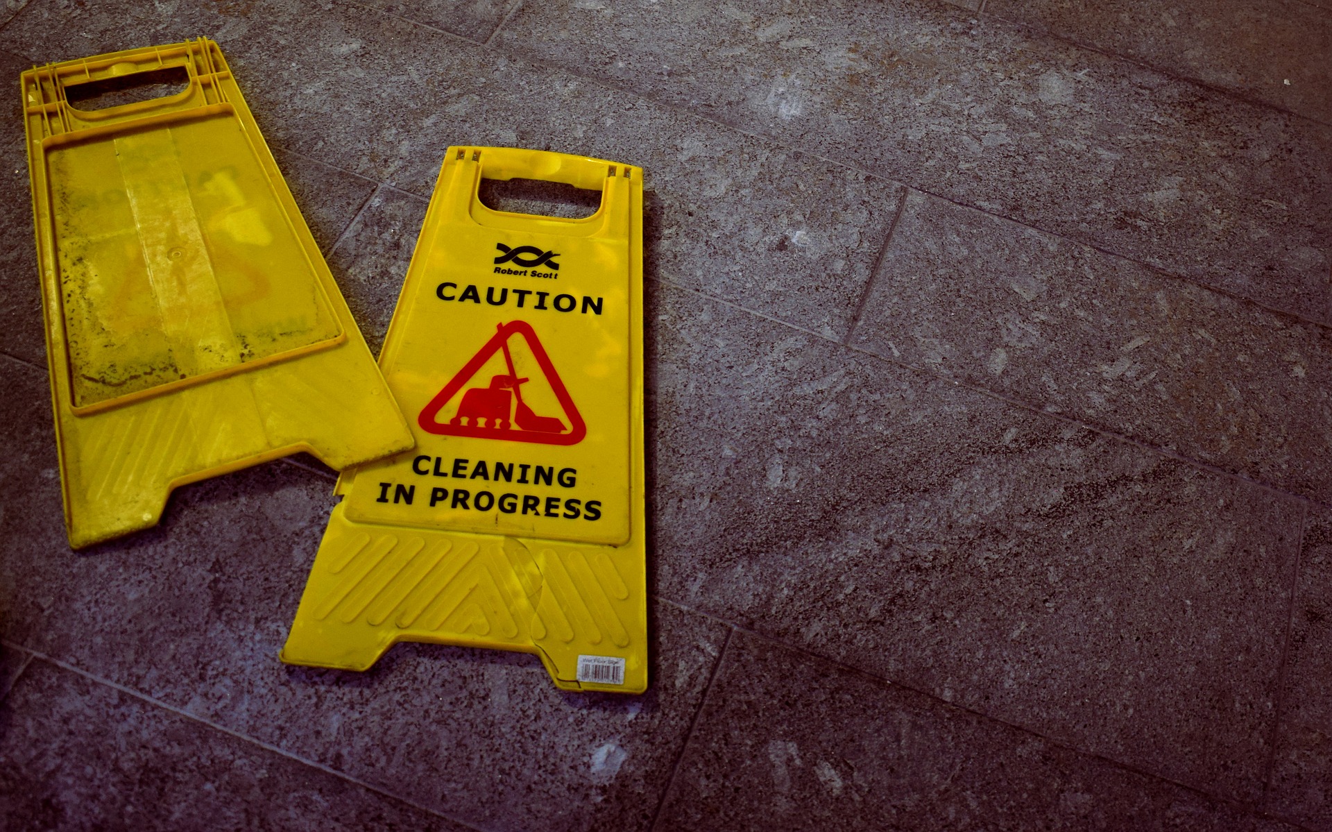 wet floor sign knocked over