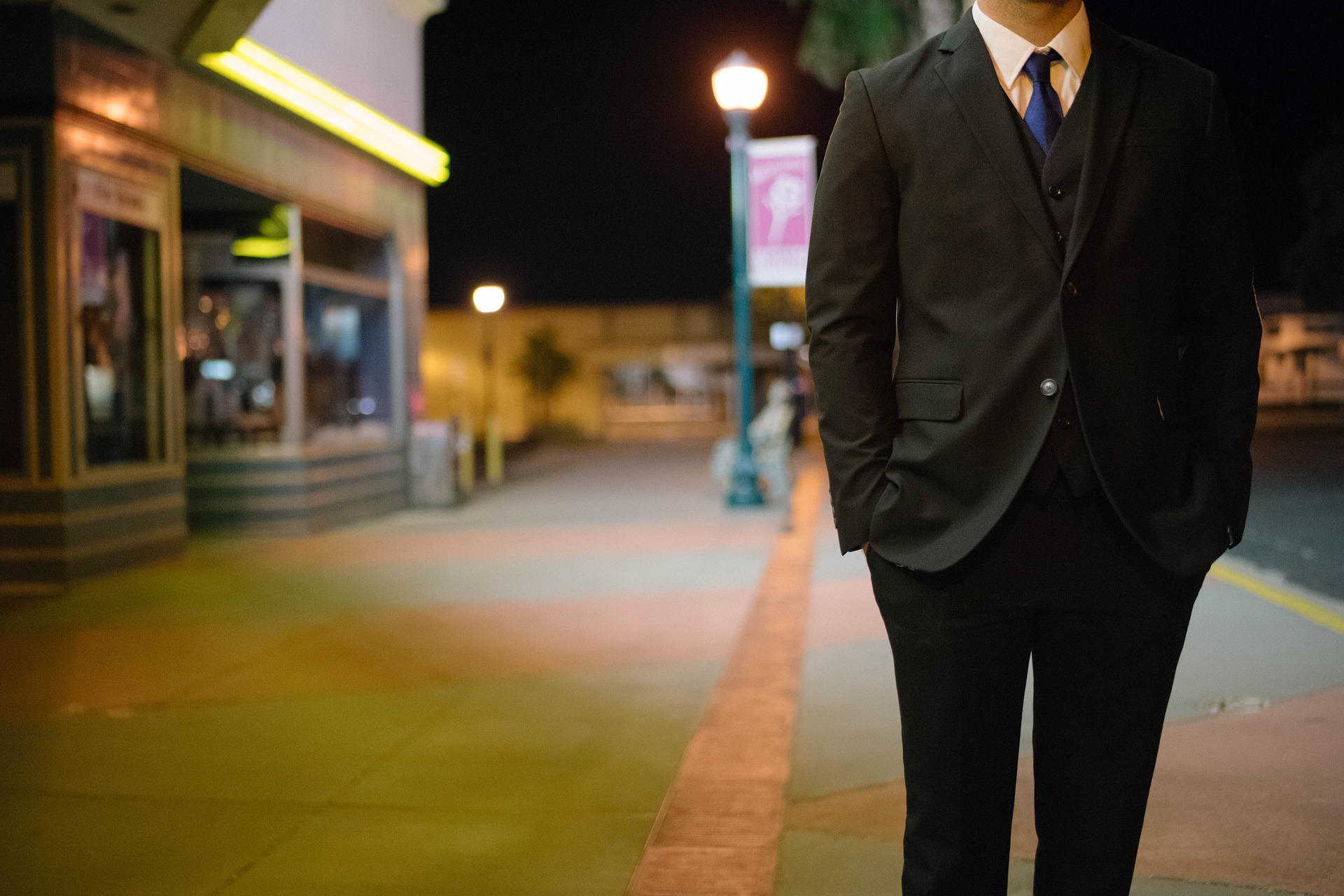 man in suit standing outside