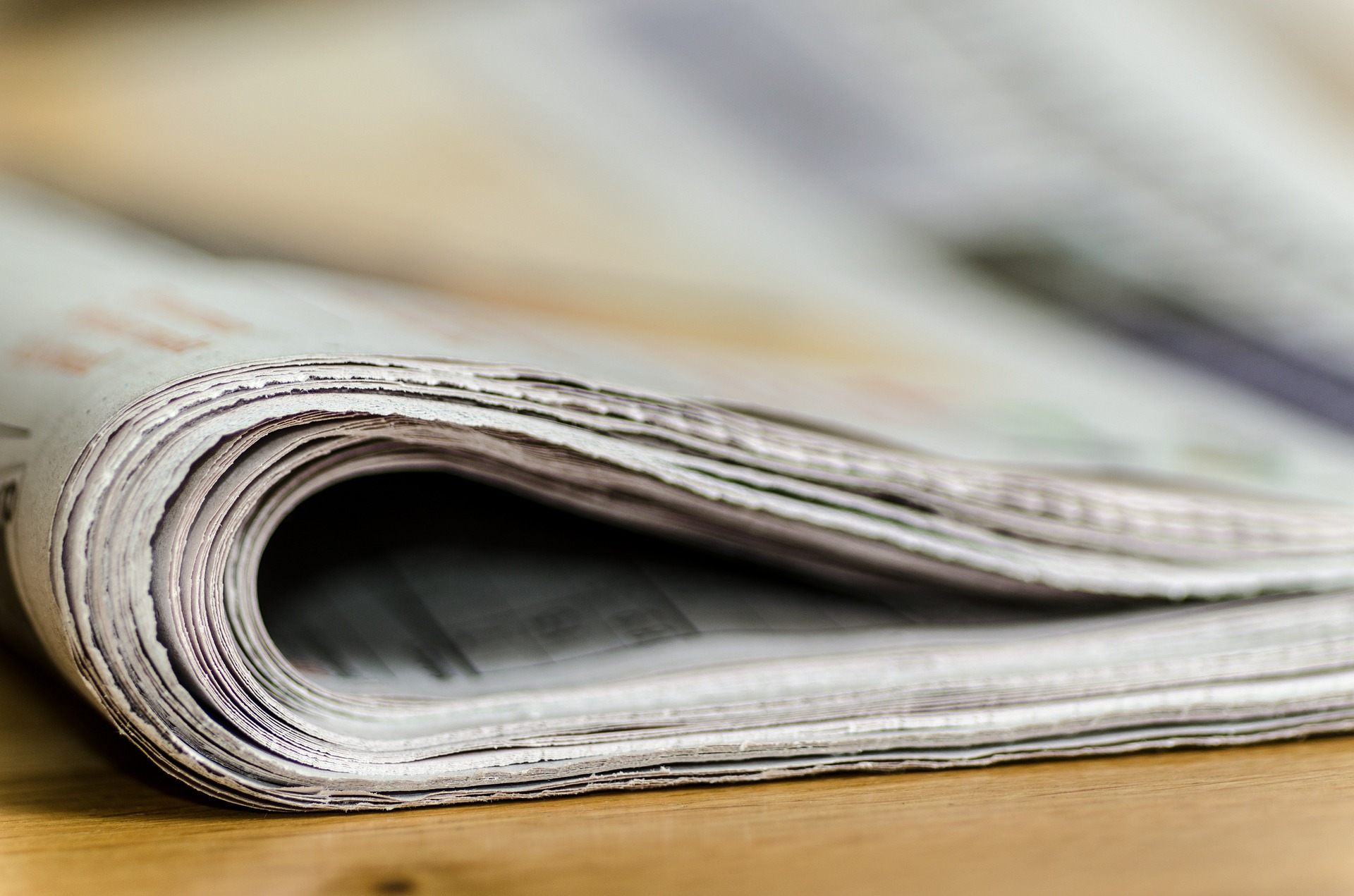 stack of local newspapers