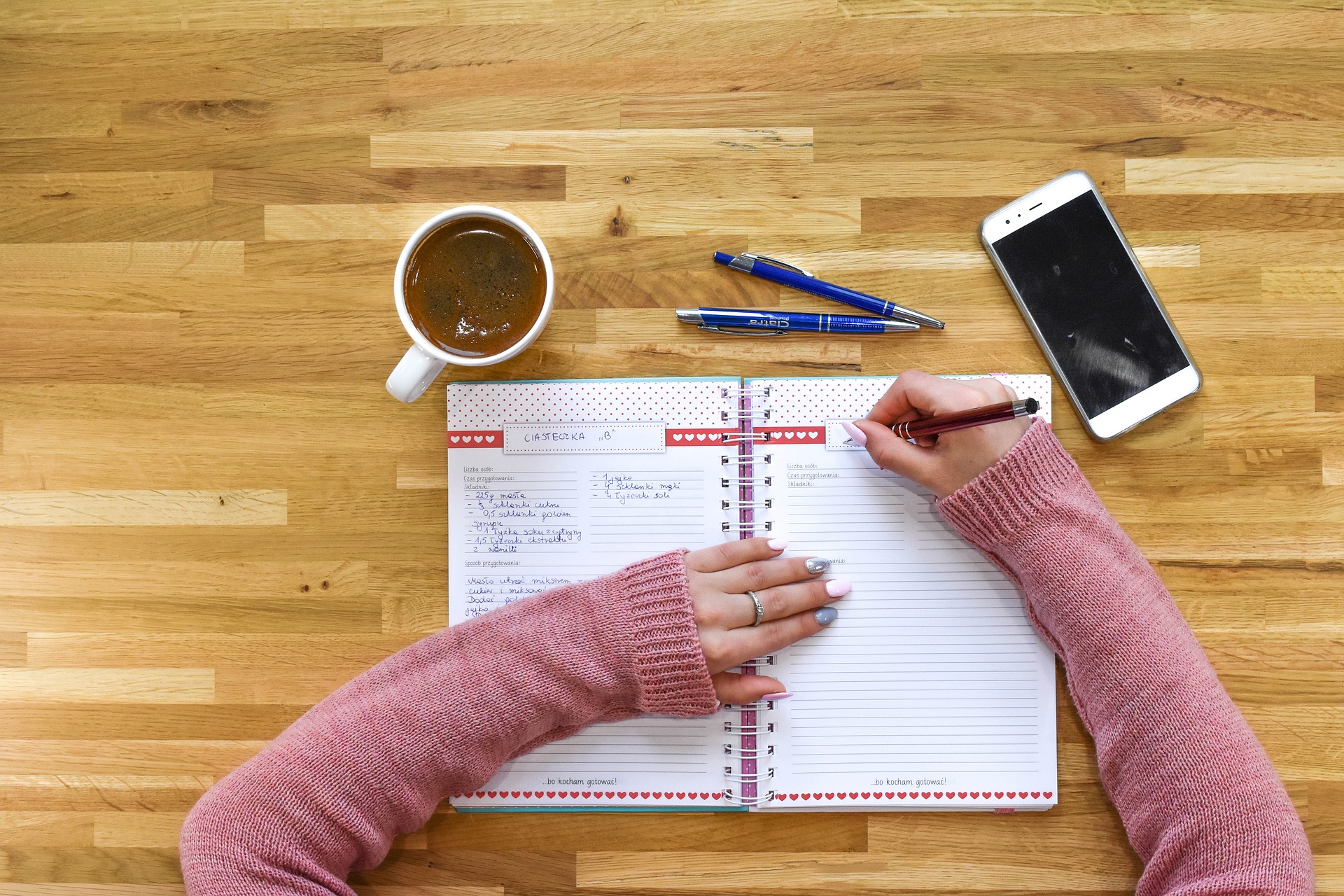 woman taking notes and planning