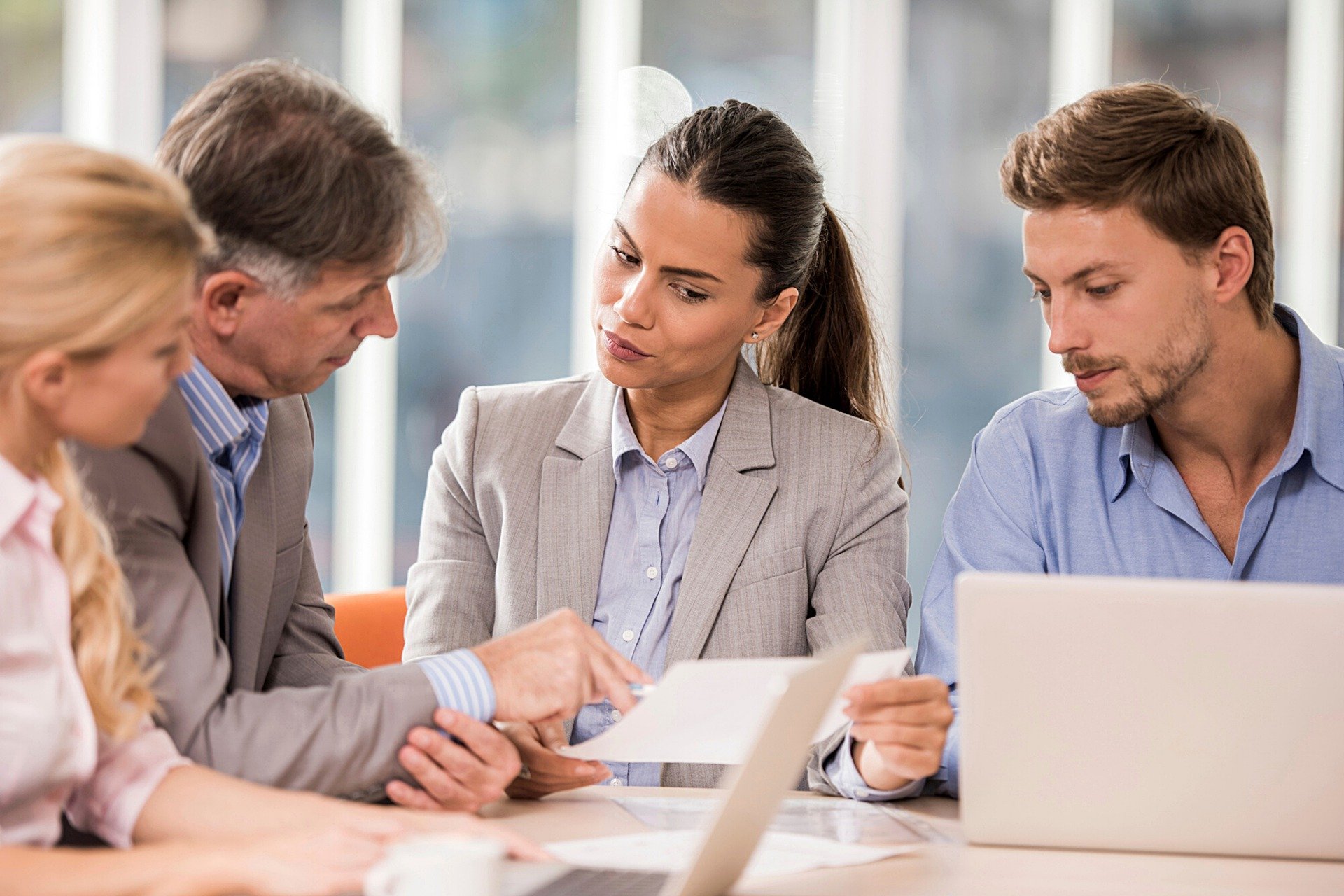 Group of business professionals discussing