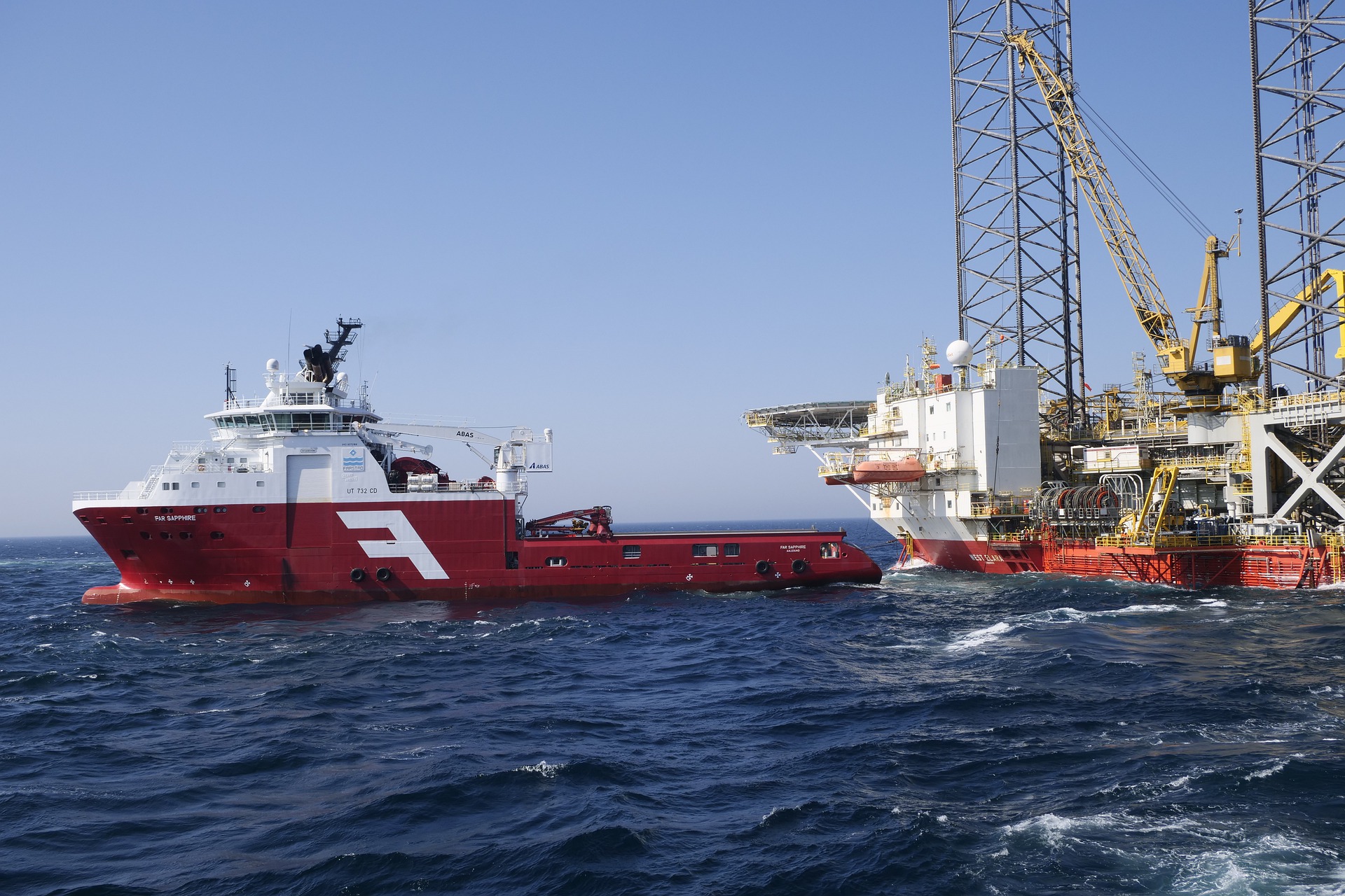 oil rig offshore with boat