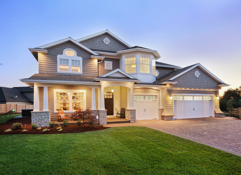 well lit home with new paint and landscaping