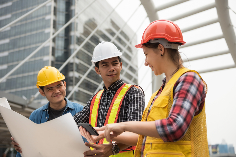 construction workers on plan