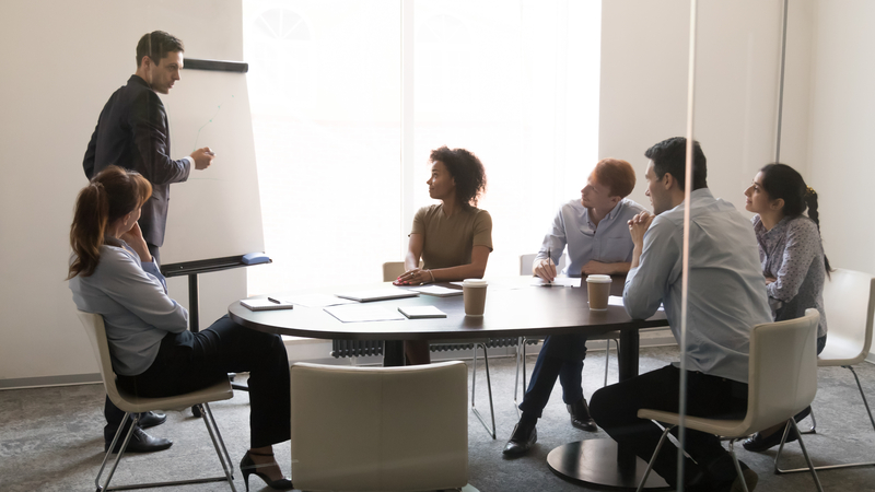 employees sitting around table