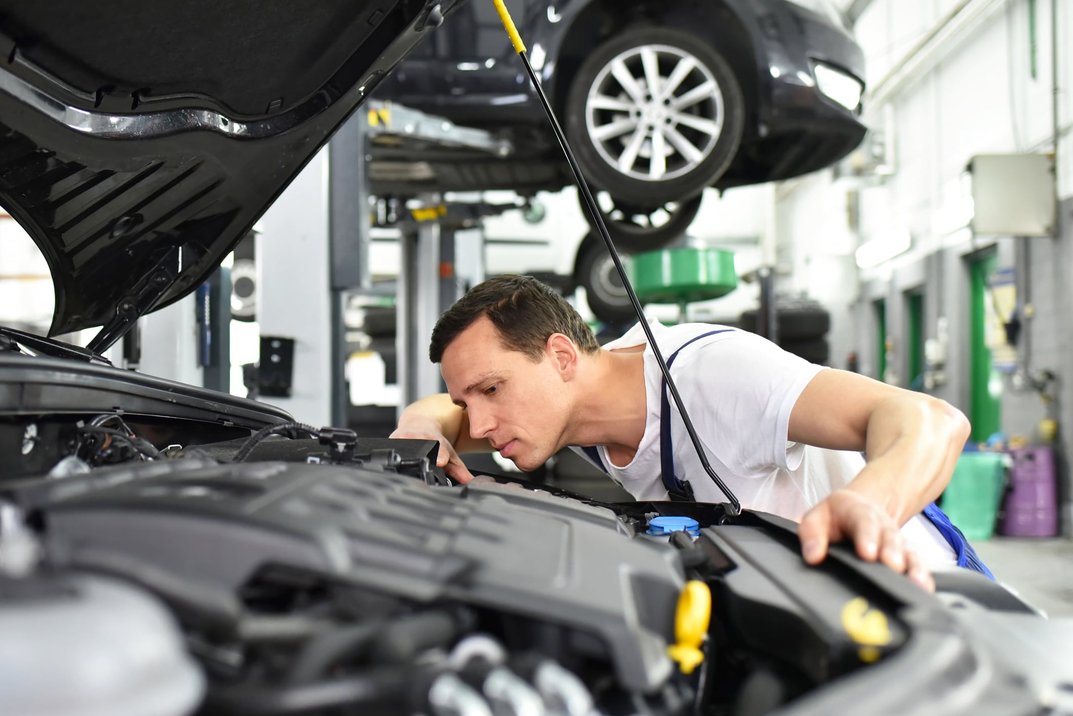 mechanic working on car