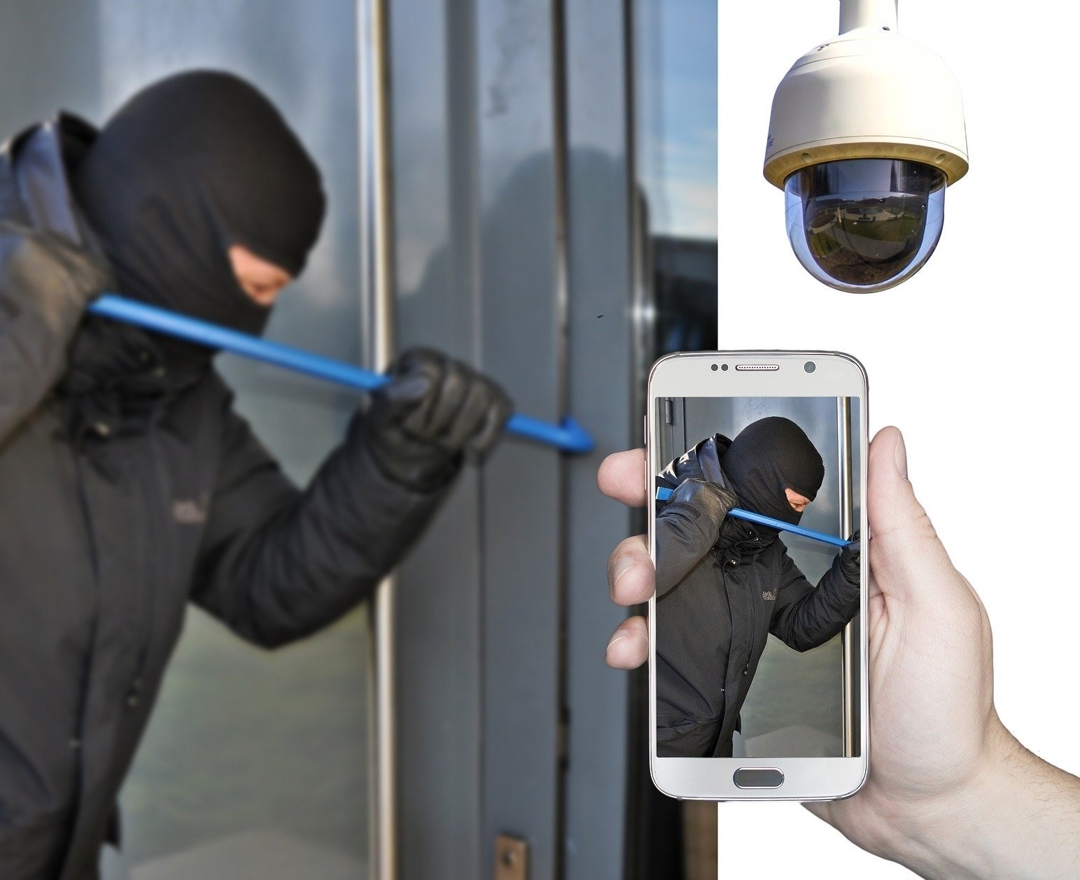 man in mask using crow bar to break in to building