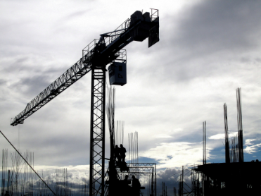 A black and white photo of an oil and gas crane