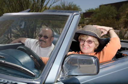 Elderly couple driving