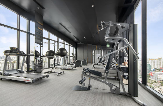 room full of treadmills and other fitness equipment