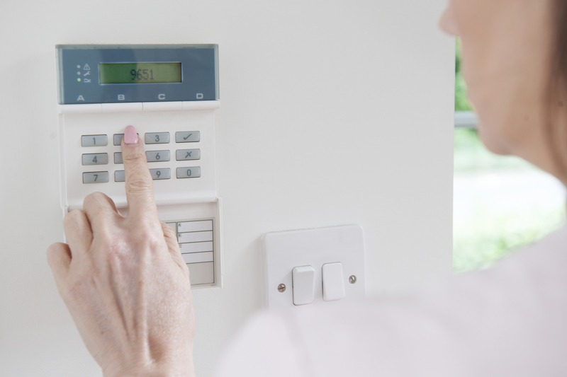 woman setting security control panel